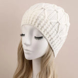 La boutique du chapeau bonnet Blanc / Ajustable (du 54 au 59) Bonnet en tricot torsadé pour femme : style classique et chic