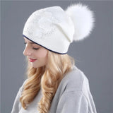 La boutique du chapeau Bonnet en laine avec pompon pour femme : look hivernal tendance