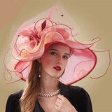 La boutique du chapeau Chapeau avec plumes et fleur